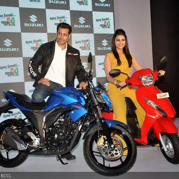 Salman Khan and Parineeti Chopra get clicked at the launch of Suzuki's Gixxer and Let's motorcycles, held in Mumbai, on January 27, 2014.  (Pic: Viral Bhayani)