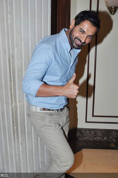 John Abraham gestures to the shutterbugs during the Times Now Foodie Awards 2013, held at ITC Parel in Mumbai on February 02, 2013.(Pic: Viral Bhayani)