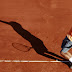 Rafael Nadal of Spain serves during his match against Gilles Simon of France during the semi-final of the Monte Carlo Masters in Monaco April 21, 2012.      REUTERS/Eric Gaillard (MONACO - Tags: SPORT TENNIS)
