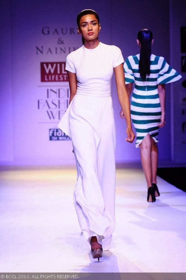 Pallavi showcases a creation by fashion designers Gauri and Nainika on Day 1 of Wills Lifestyle India Fashion Week (WIFW) Spring/Summer 2014, held in Delhi.