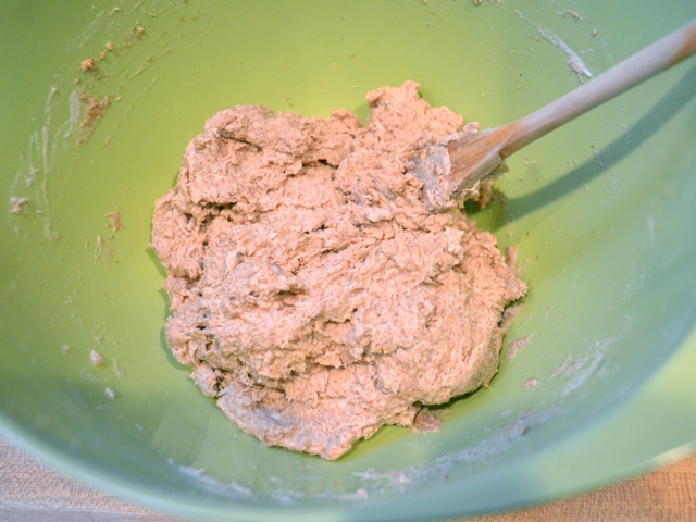 Water added to dry ingredients in mixing bowl 