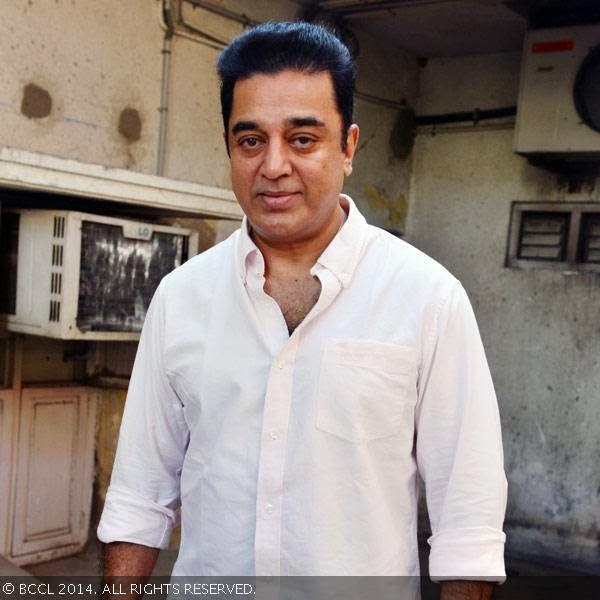 Kamal Haasan poses for the lens during a press meet on being conferred the Padma Bhushan Award, held at his Alwarpet office.