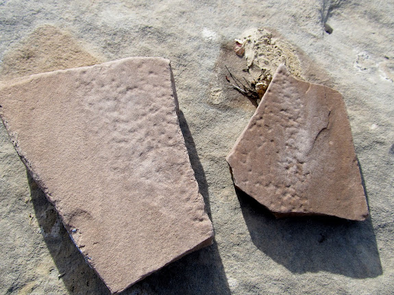Broken grinding stones found near the rock circle