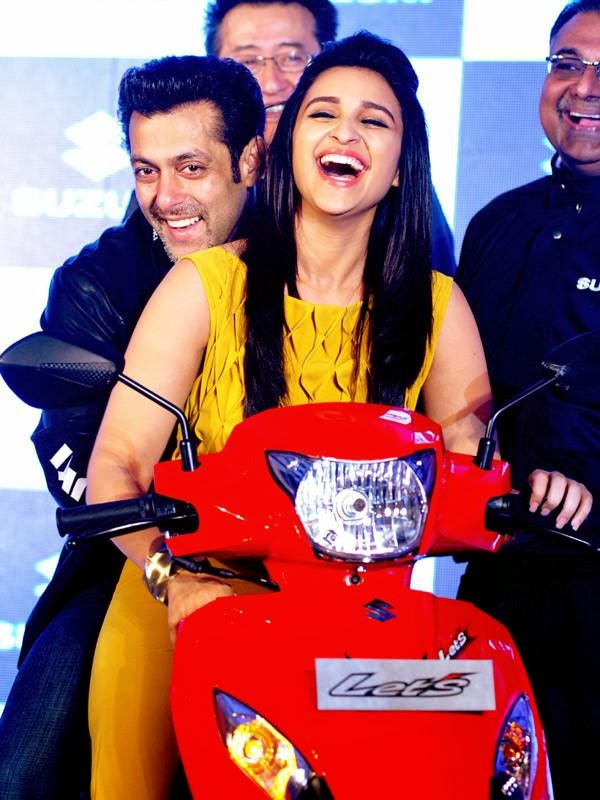 Salman Khan and Parineeti Chopra caught in candid moment at the launch of Suzuki's Gixxer and Let's motorcycles, held in Mumbai, on January 27, 2014.  