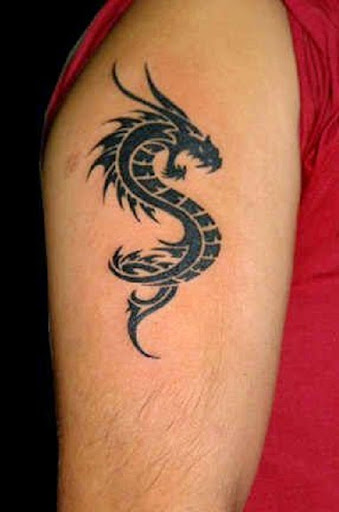black tribal dragon tattoos on shoulder