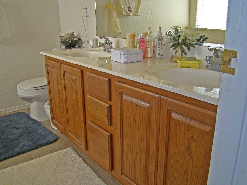 Close-up of dual sinks and a 2 bathroom home