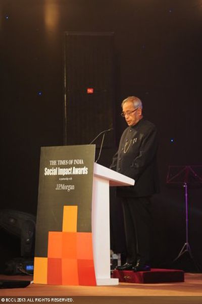 President Pranab Mukherjee addressing the gathering during the Times of India Social Impact Awards, being given to changemakers within NGOs, corporates and the government who have quietly worked to transform the lives of millions of marginalized Indians. 