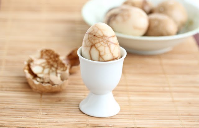 photo of a tea leaf egg in an egg cup