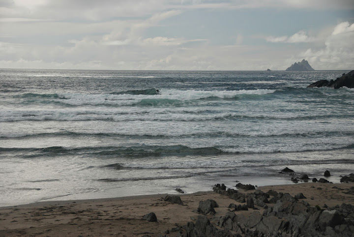 St Finian’s Bay, surfers, and Skellig Islands