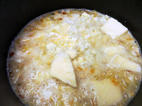 Brie and Blue Cheese Fondue Recipe - melting in the cheeses into the shallot wine mixture