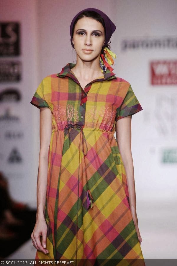 Alesia Raut showcase a creation by fashion designer Paromita Banerjee on Day 2 of Wills Lifestyle India Fashion Week (WIFW) Spring/Summer 2014, held in Delhi.