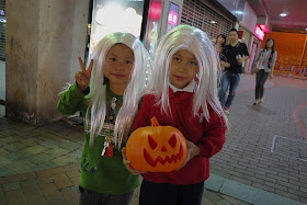 two kids wearing wigs for Halloween in Changsha, China