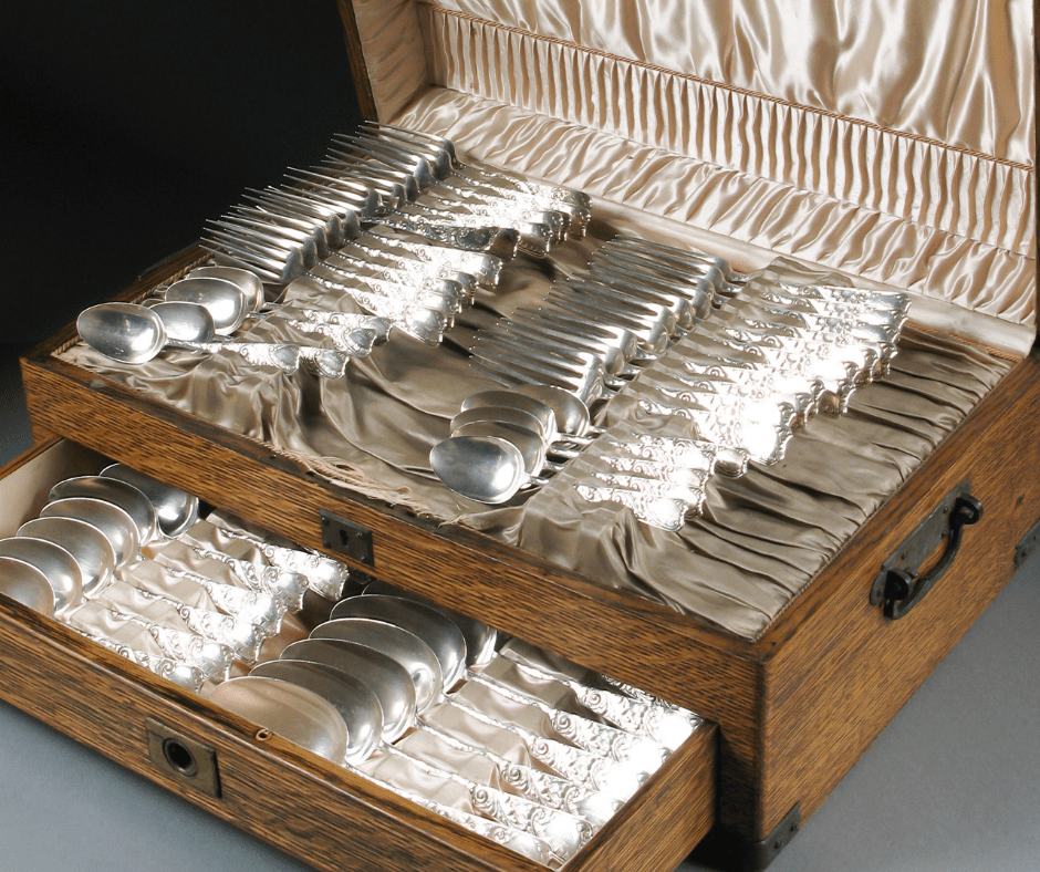 Pieces of Silverware sets in an open chest