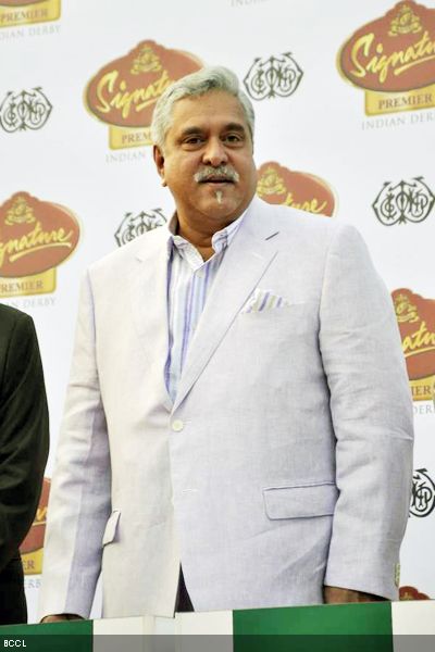 Debonair Vijay Mallya poses for the camera during 'Signature Premiere Indian Derby', held at Mahalaxmi race course in Mumbai on February 3, 2013. (Pic: Viral Bhayani)
