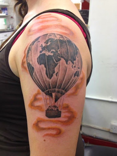 Parachute Balloon Cloud tattoo on her shoulder Women