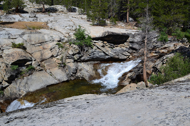 creek churning through a gouge in the granite