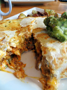 Portage Bay Cafe, Migas, a flour tortilla stuffed with 3 chipotle-cumin scrambled eggs, chorizo sausage, Tillamook cheddar, fresh basil, homemade salsa and sour cream and then served with fresh avocado salsa, breakfast, Seattle