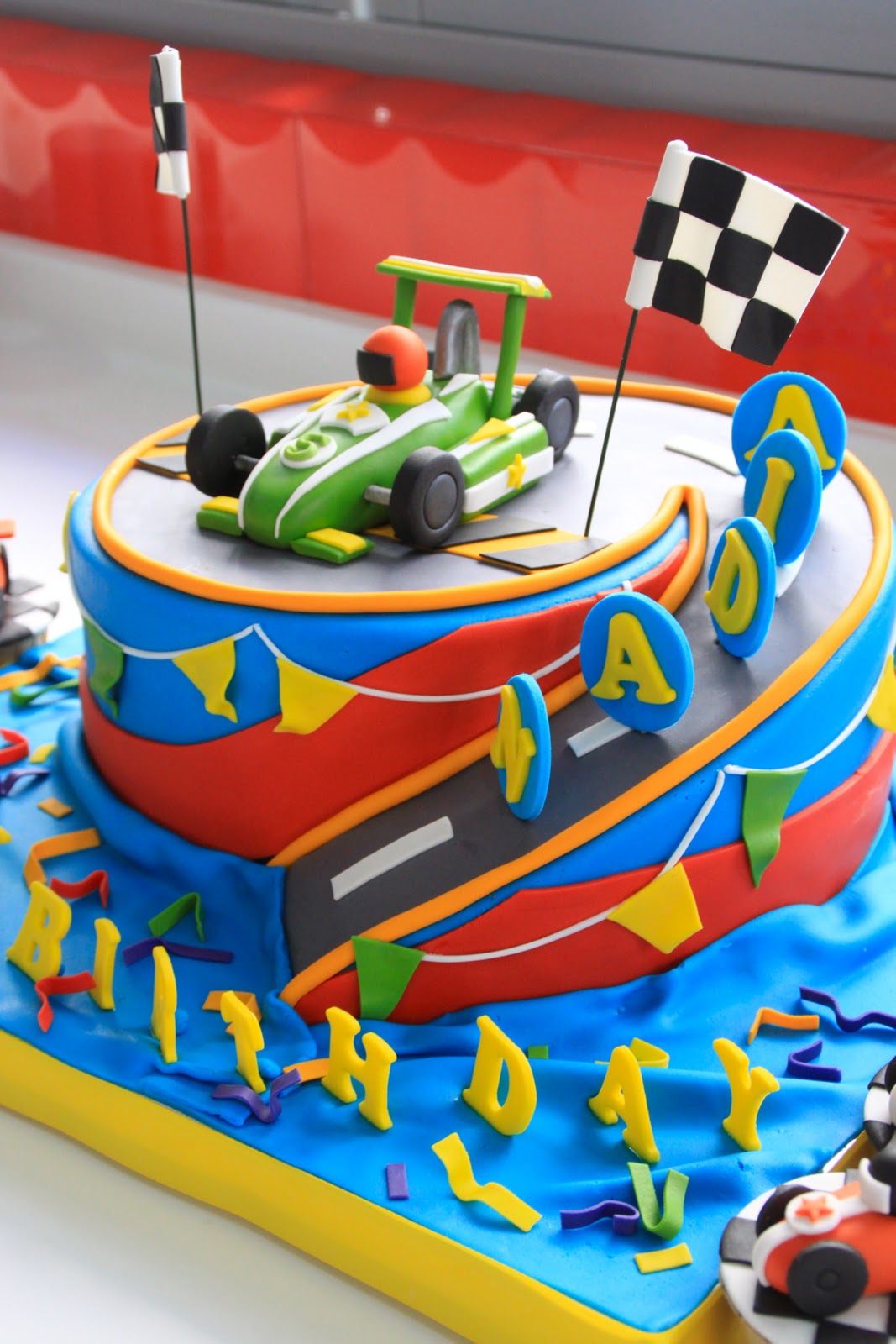 Celebrate with Cake!: Race Car Cake and Cupcakes
