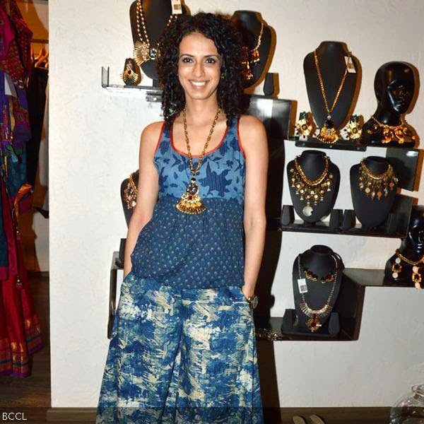 Aparna Badlani's radiant necklace matches her smile during designers Shruti Sancheti and Priyadarshi Rao's collection preview, held at Atosa, in Mumbai, on October 11, 2013. (Pic: Viral Bhayani)
