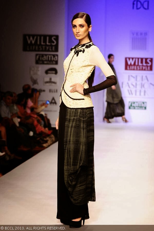 Lekha walks the ramp for fashion designer Pallavi Singhee on Day 5 of Wills Lifestyle India Fashion Week (WIFW) Spring/Summer 2014, held in Delhi.<br /> 