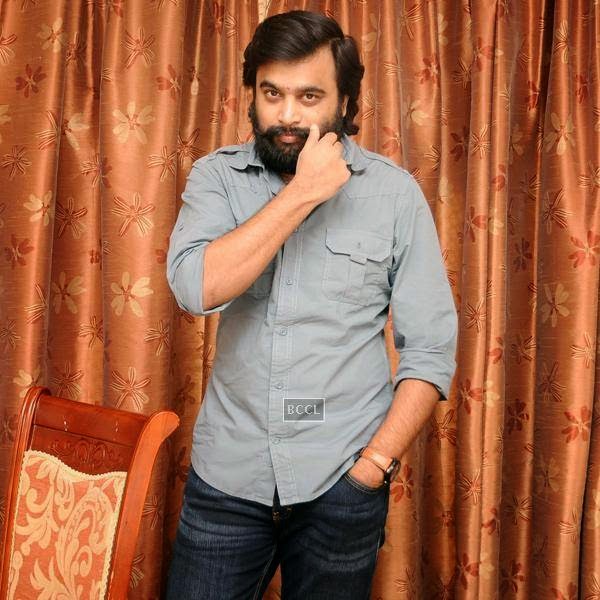 M Sasikumar poses for the cameras during the movie pooja of Thaarai Thappattai, held in Chennai.