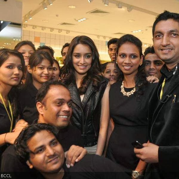 Shraddha Kapoor poses with the staff during the launch of international fashion brand Forever 21 store at a mall in Mumbai. (Pic: Viral Bhayani)