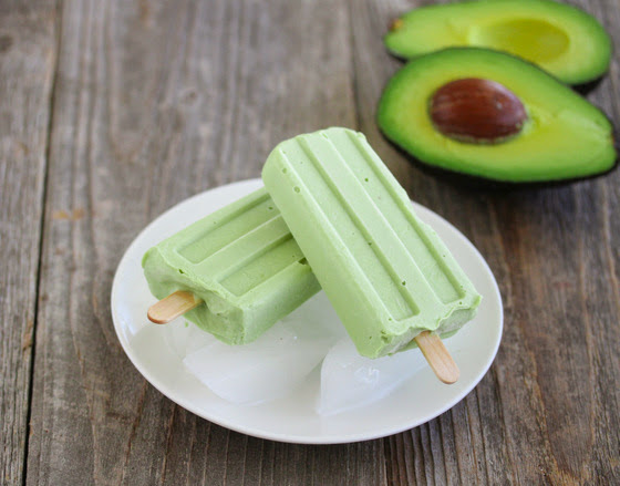 photo of two Avocado Coconut Ice Pops on a plate