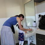 LePort School Parent/Child Montessori - mommy guiding her child by the sink