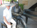 Ted Price sits with a friend