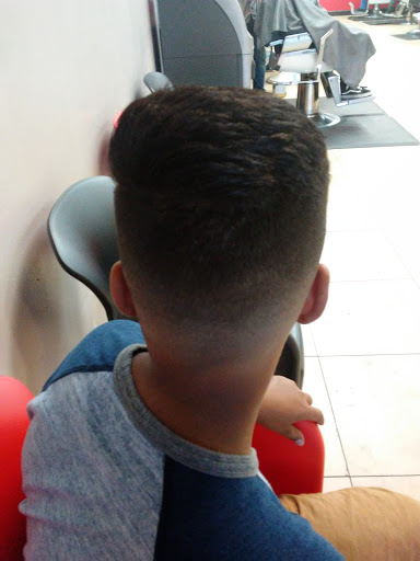 Barber Shop «Axx Barber Shop», reviews and photos, 7264 W Colonial Dr, Orlando, FL 32818, USA