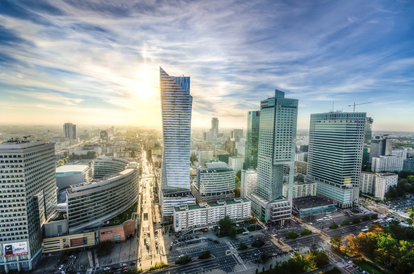 modern skyscrapers zlota 44 buildings futuristic architecture in downtown warsaw during sunset in poland