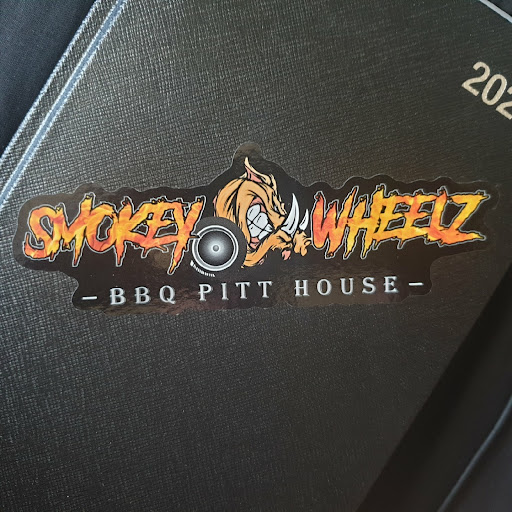 Smokey Wheelz BBQ Pitt House logo