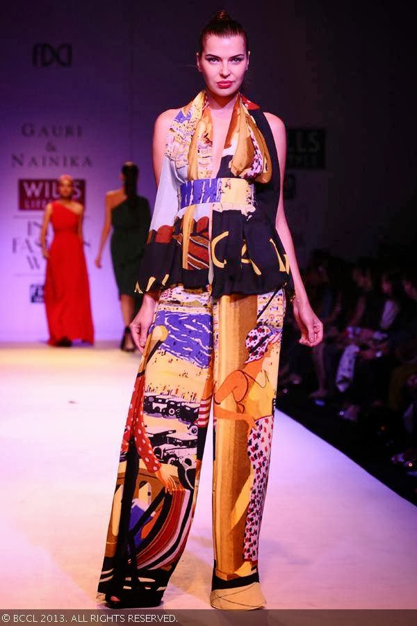 Katrin walks the ramp for fashion designers Gauri and Nainika on Day 1 of the Wills Lifestyle India Fashion Week (WIFW) Spring/Summer 2014, held in Delhi.