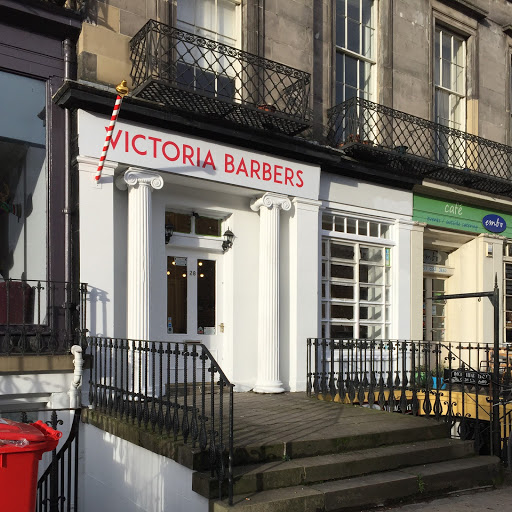 Victoria Barbers logo