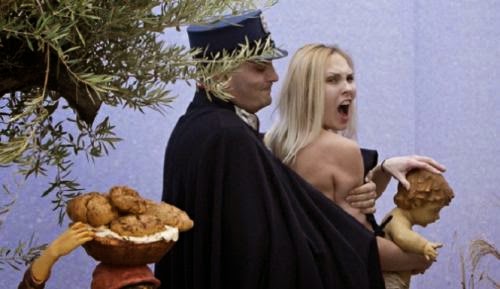 Topless Femen Activist Resurfaces And Is Arrested For Snatching Baby Jesus From Vatican
