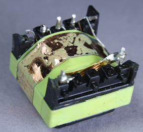 A copper 'belly band' provides a shield around the flyback transformer.