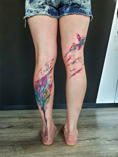 watercolor tattoos for girls on the leg