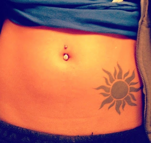 sun tattoos around navel