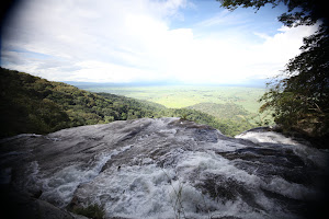 The Sanje River drops off the edge of the mountain.