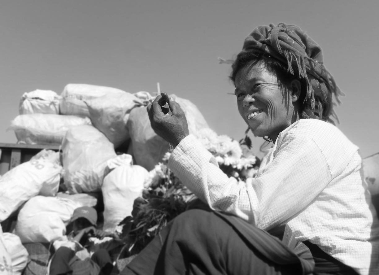 A tribal woman at the Inle Lake marketplace
