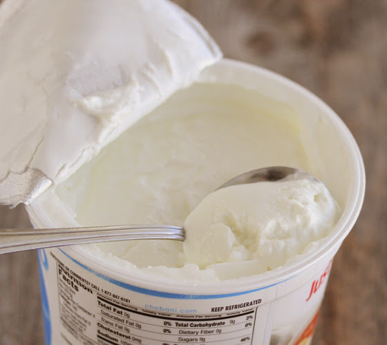 photo of an opened container of yogurt