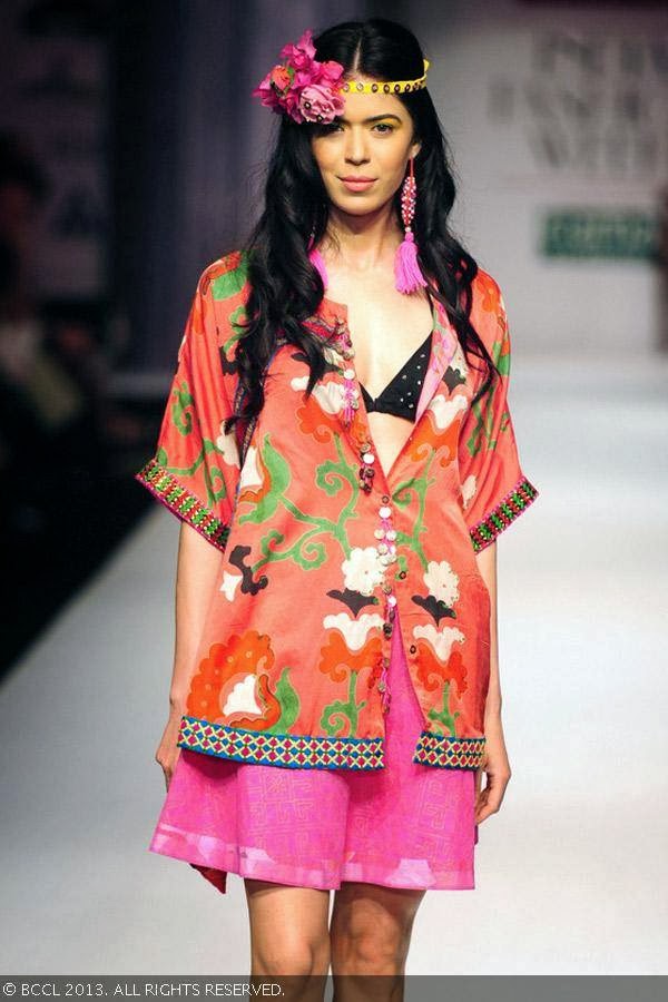 Sucheta Sharma showcases a creation by fashion designer Anupama Dayal on Day 1 of Wills Lifestyle India Fashion Week (WIFW) Spring/Summer 2014, held in Delhi.