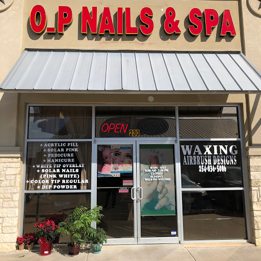 O.P Nails & Spa logo