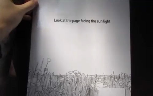 Video : 陽の光にかざした時だけ、カラーになる白黒広告