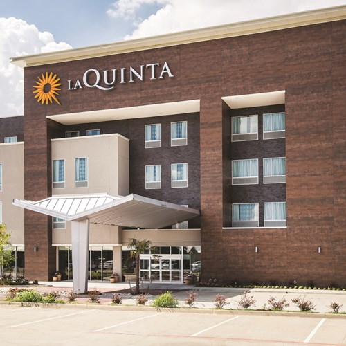 La Quinta Inn & Suites by Wyndham Dallas Plano - The Colony logo