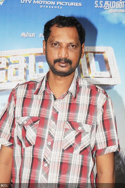 Na. Muthukumar arrives for the the audio launch of their movie 'Settai', held at Sathyam Cinemas in Chennai.