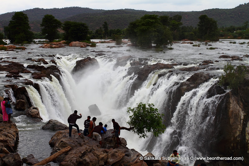 Locals told that 2 weeks back, the water was flowing over where these people are standing, which means the river was flowing above the waterfall level