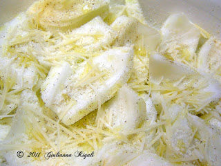 Fennel drizzled with olive oil, sea salt, pepper, and cheese