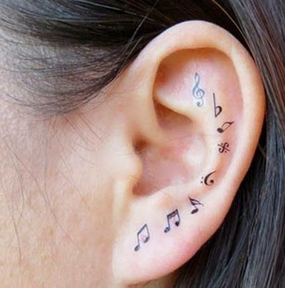 Music tattoos on ear