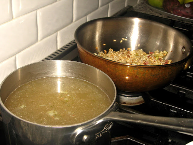 The stock and rice pan for Pan Fried Skate with Pancetta and Red Onion Risotto
